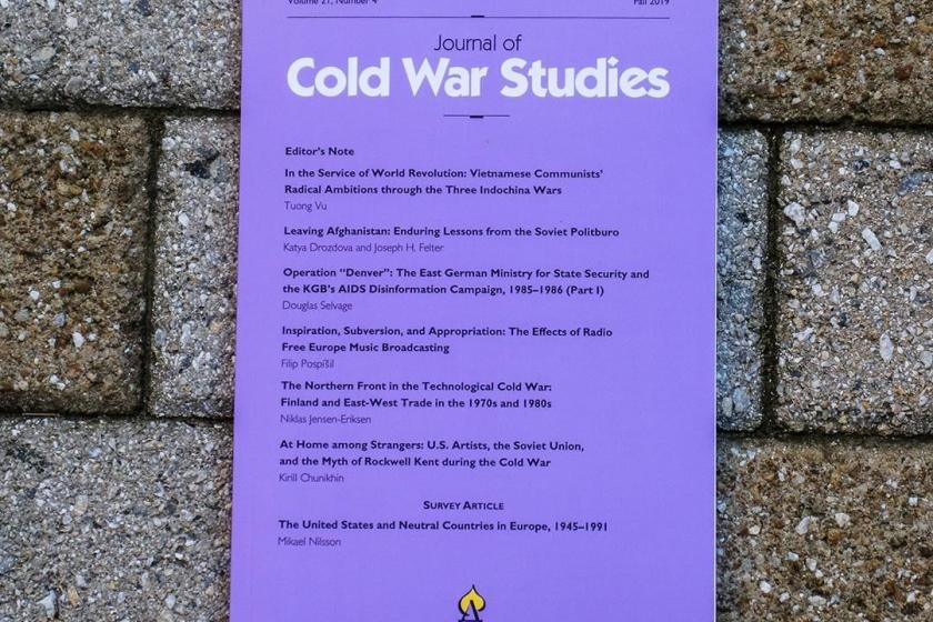 Copy of Journal of Cold War Studies against a brick background