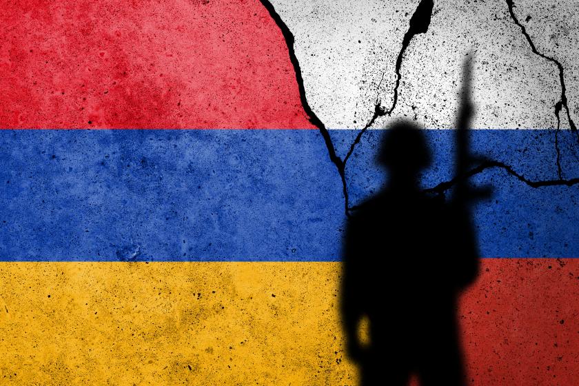 Flag of Armenia and Russia painted on a concrete wall.